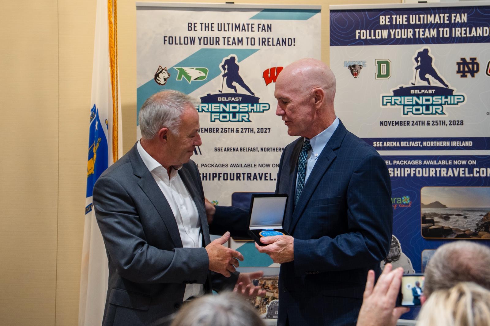 Redgate Principal Ralph Cox, member of the Friends of the Friendship Four Advisory Board, presented with the Belfast Homecoming Ambassador Medal, a prestigious honour presented annually to outstanding individuals who have shown exceptional commitment to reconnecting with, investing in, and supporting Belfast.